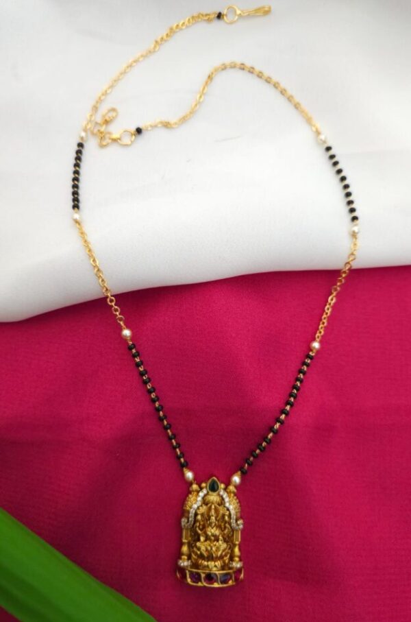 Black beeds with Lakshmi pendant